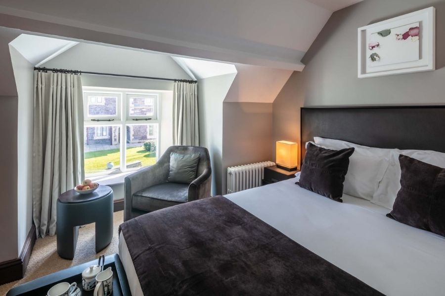 Penrhiw Priory Court Bedroom with Seating